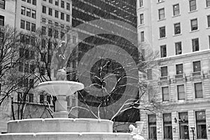 Pulitzer Fountain under the snow in black and white