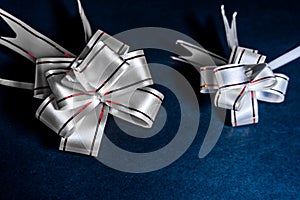 Pull Flower Ribbon for Gift Wrap Lighting Effect On Black Background Wallpaper Image Beautiful Abstract Scenario Image