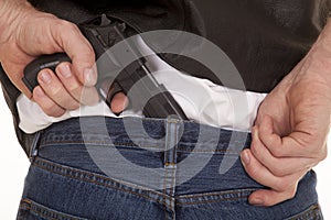 Pull gun out of pants