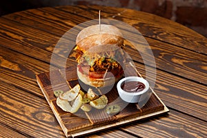 Pulled pork BBQ burger with tomatoes and jalapeno selected focus