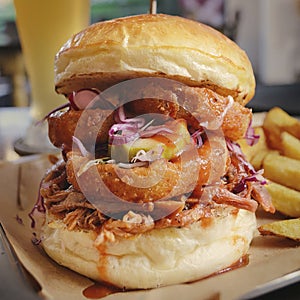 Pulled Pork Burger served with thickly cut beefsteak fries.