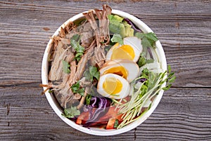 Pulled pork loaded ramen bowl dish