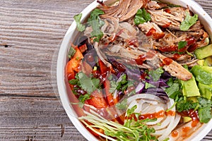 Pulled pork loaded ramen bowl dish