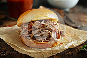 Pulled pork sandwich on a brioche bun photo