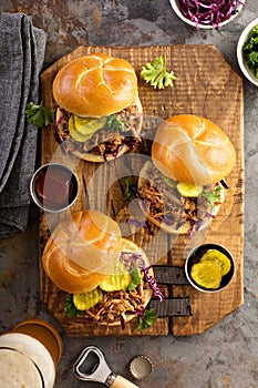 Pulled pork sandwiches with cabbage and pickles