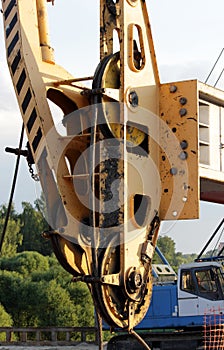 pulley from heavy machinery crane in the construction of road junction in Moscow.