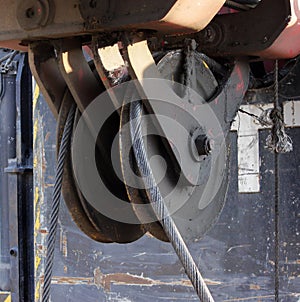 pulley from heavy machinery - Machine to hammer the piles in the construction road junction in Moscow.