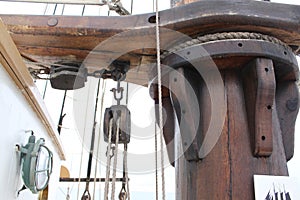 Pulley and mast on a large wooden sailing boat