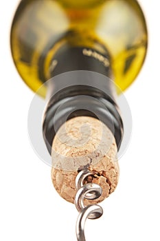 pulling corkscrew cork from the bottle