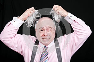 Pulling his hair out