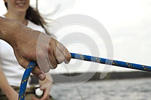 Pulling the rope while sailing