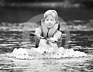 Pulling a Water Skier / Boy