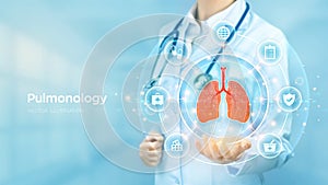 Pulmonology medicine concept. Respiratory system examination and treatment. Doctor holding in hand the hologram of Lungs and