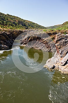 Pulo do Lobo or wolf`s leap waterfall and cascade on river Guadi