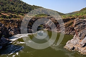 Pulo do Lobo or wolf`s leap waterfall and cascade on river Guadi