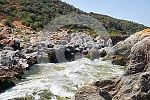 Pulo do Lobo or wolf's leap waterfall and cascade on river Guadiana, Alentejo, Portugal