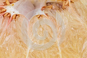 Pulp of a rope pomelo fruit, close-up