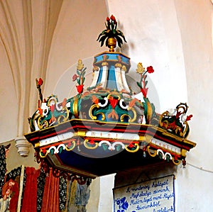 Pulpit inside in the old fortified church Dirjiu, Transylvania, Romania