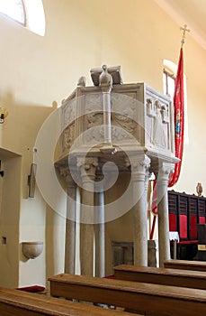 Pulpit in the church Saint Sylvester Pope in Kanfanar, Croatia photo