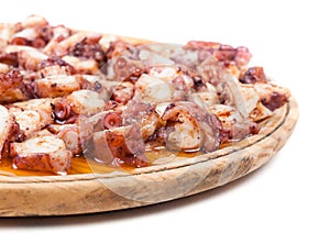 Pulpo a feira in a wooden plate photo