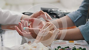 Pulse diagnostic with hand on a tibetan medicine