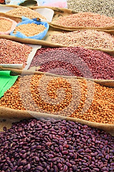 Pulses and Beans Displayed on Burlap Bags on Mexican Market