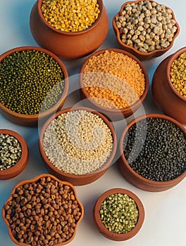 Pulses and cereals in earthen bowls