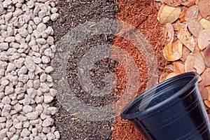 Pumice pebbles ,volcanic rock,Dry leaves ,coconut coir and soil with Black plastic pot