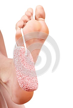 Pumice stone on feet.