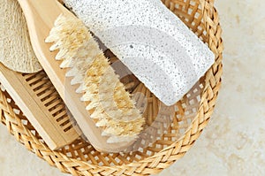 Pumice stone and wooden massage body brush. Eco friendly toiletries set. Natural beauty treatment, skin care or homemade pedicure