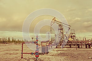 Pump jack. Extraction of oil. Petroleum concept.