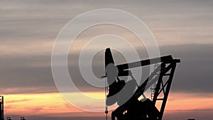 Pump Jack Fracking for Oil North Dakota Sunset Bakken