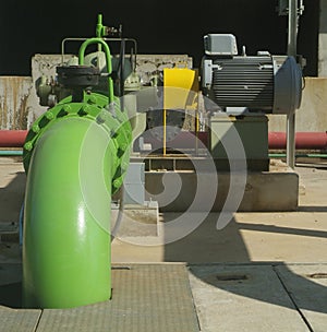 Pump and pipes at cooling tower