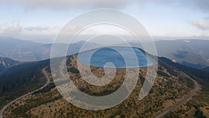 Pumped water storage hydroelectric plant reservoir aerial drone view