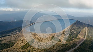 Pumped water storage hydroelectric plant reservoir aerial drone view