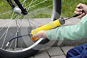 Pumping bicycle tire photo