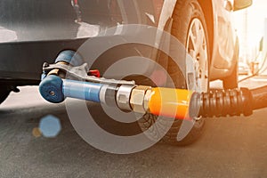 Pumping gas fuel car at oil station. Woman hand refuel petrol nozzle tank. Refueling transportation and Automotive