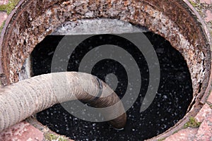 Pumping sewage from the drain hole