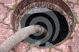 Pumping sewage from the drain hole