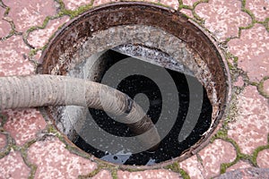 Pumping sewage from the drain hole