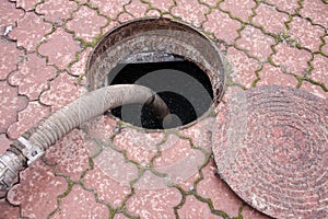 Pumping sewage from the drain hole