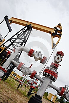 Pumpjack and oilwell. photo