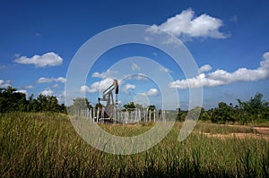 A pumpjack is the overground drive for a reciprocating piston pump in an oil well.