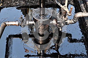 Pumpjack pumping crude oil from oil well