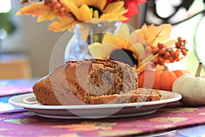 Pumpkin bread loaf on a white plate