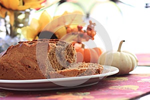 Pumpkin bread loaf on a white plate