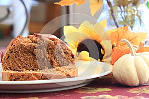 Pumpkin bread loaf on a white plate