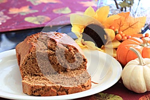 Pumpkin bread loaf on a white plate