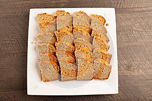 Pumpkin bread on white platter top view
