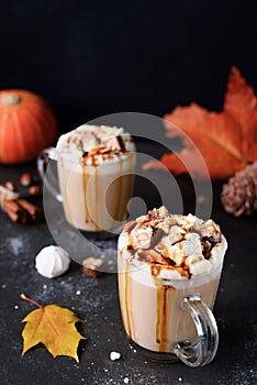 Pumpkin Caramel Spice Latte on black background